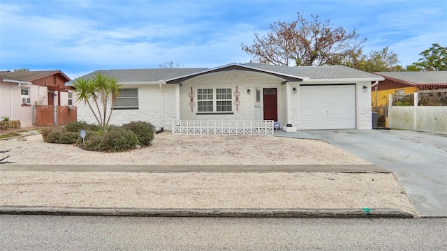 single story home featuring a garage