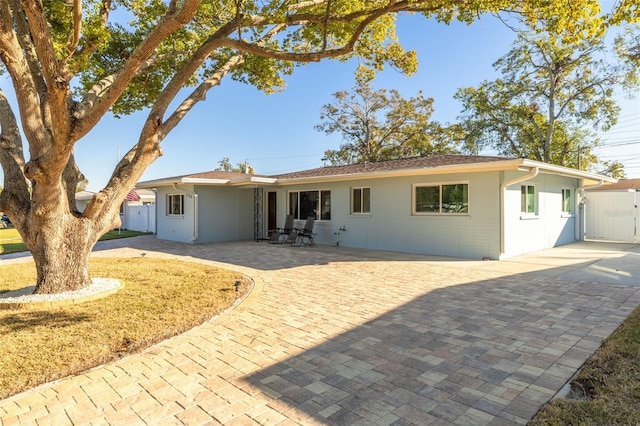 view of front of home with a patio area