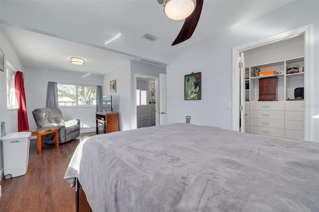 bedroom featuring ceiling fan and dark hardwood / wood-style floors