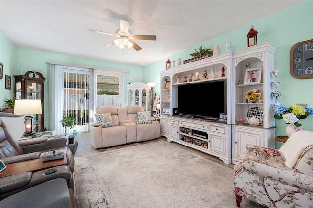 living room featuring ceiling fan