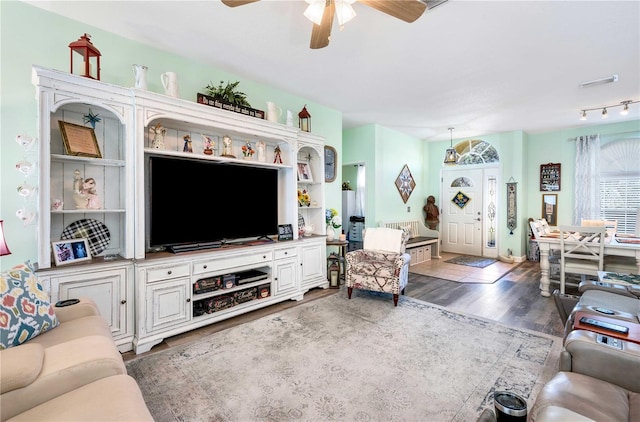 living room with dark hardwood / wood-style floors