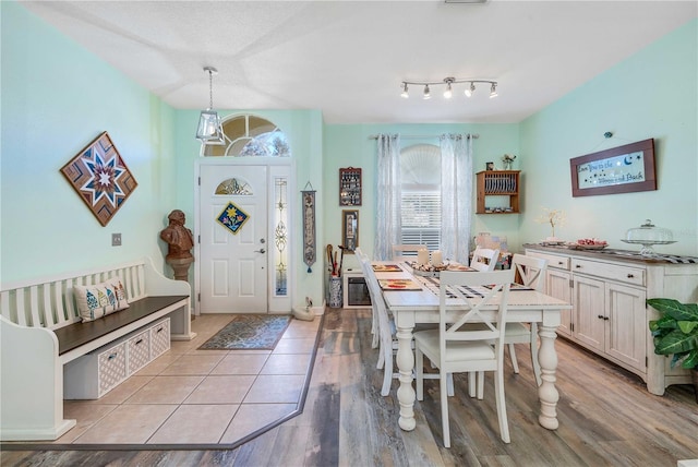 dining area featuring light wood-type flooring