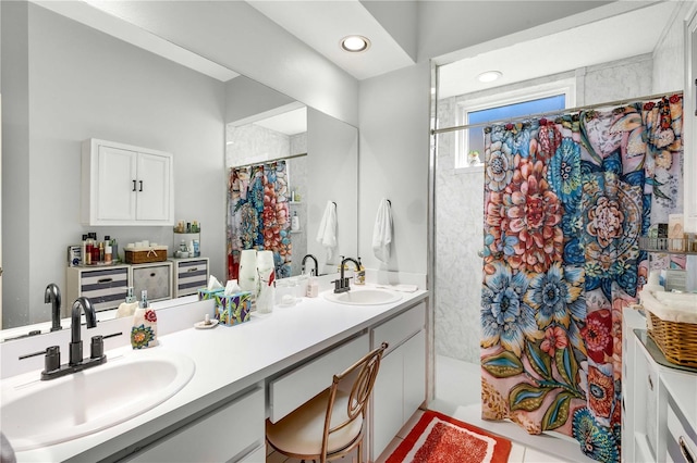 bathroom featuring a shower with shower curtain and vanity