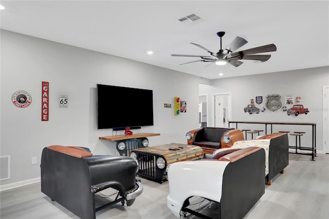 living room featuring ceiling fan