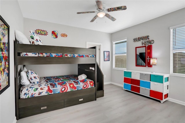 bedroom featuring light hardwood / wood-style floors and ceiling fan