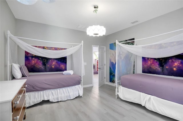 bedroom featuring hardwood / wood-style flooring