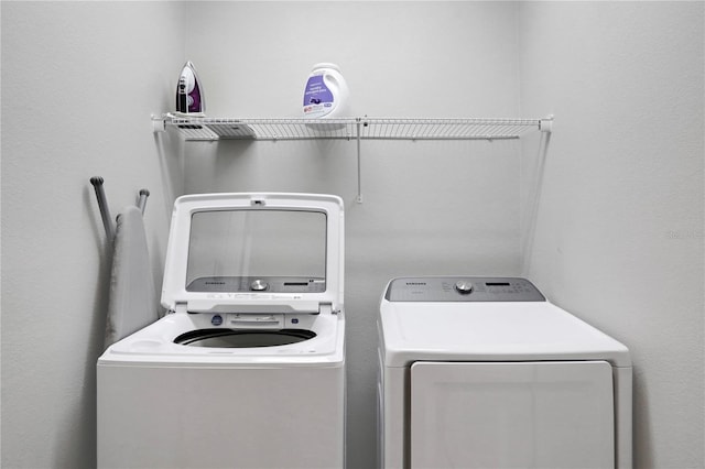 laundry area featuring washing machine and dryer