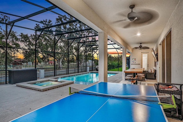 exterior space featuring ceiling fan, concrete floors, and a pool