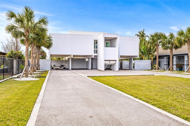 contemporary house with a front lawn