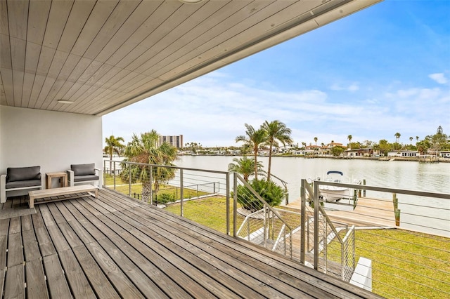 wooden deck with a water view