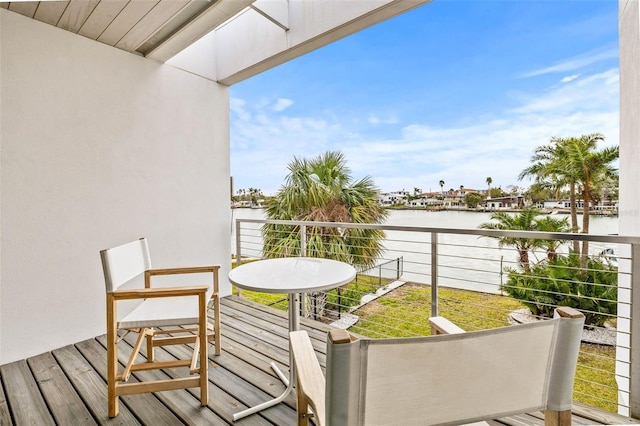 balcony featuring a water view