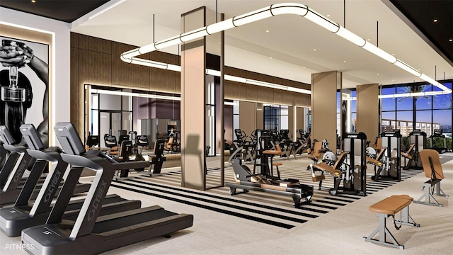 gym with wood walls and light carpet