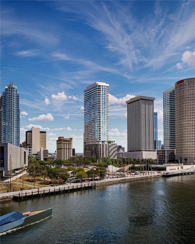 property's view of city featuring a water view