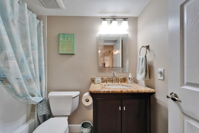 18325 Gulf Blvd Unit 407, Redington Shores, FL 33708 - bathroom with toilet, vanity, baseboards, and shower / bath combination with curtain