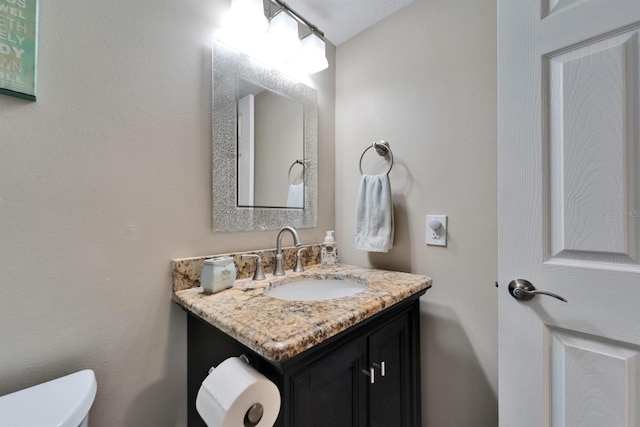 18325 Gulf Blvd Unit 407, Redington Shores, FL 33708 - bathroom featuring vanity and toilet