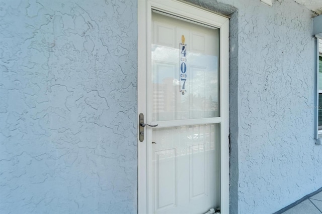 18325 Gulf Blvd Unit 407, Redington Shores, FL 33708 - entrance to property featuring stucco siding