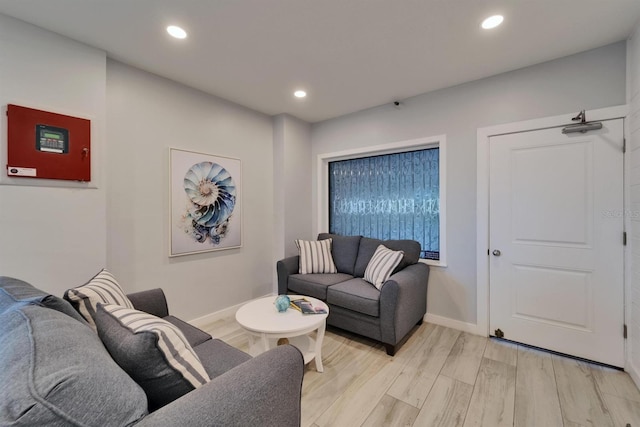 18325 Gulf Blvd Unit 407, Redington Shores, FL 33708 - living area featuring light wood finished floors, baseboards, and recessed lighting