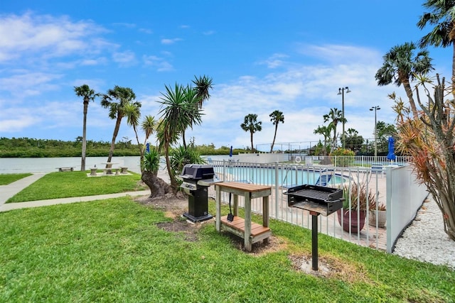 18325 Gulf Blvd Unit 407, Redington Shores, FL 33708 - community pool featuring a grill and a water view