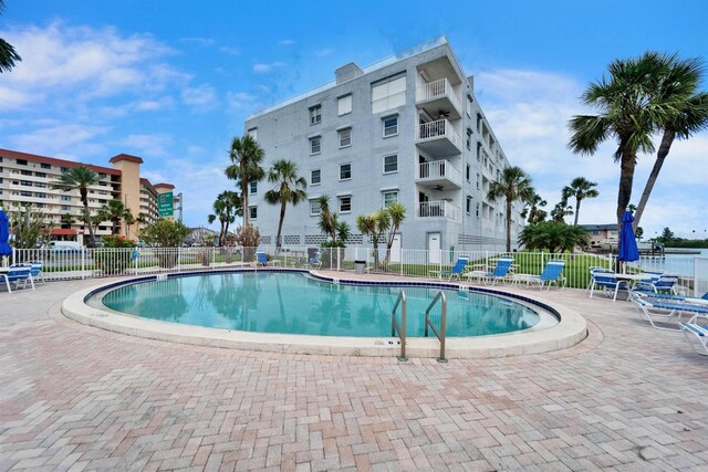 18325 Gulf Blvd Unit 407, Redington Shores, FL 33708 - community pool featuring fence