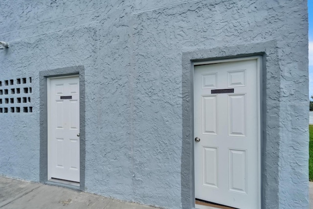 18325 Gulf Blvd Unit 407, Redington Shores, FL 33708 - entrance to property featuring stucco siding