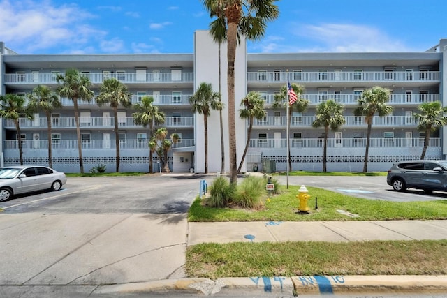 18325 Gulf Blvd Unit 407, Redington Shores, FL 33708 - view of apartment building / complex with uncovered parking
