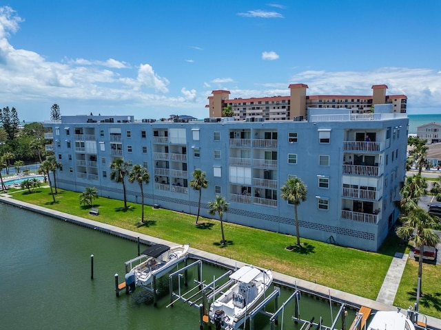 18325 Gulf Blvd Unit 407, Redington Shores, FL 33708 - view of apartment building / complex featuring a water view and boat lift