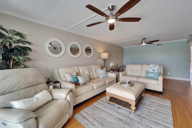 18325 Gulf Blvd Unit 407, Redington Shores, FL 33708 - living room with a ceiling fan, wood finished floors, ornamental molding, and baseboards