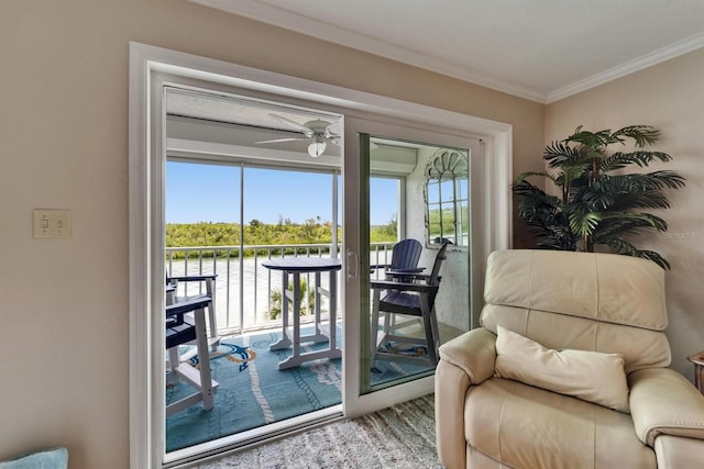 18325 Gulf Blvd Unit 407, Redington Shores, FL 33708 - entryway featuring ornamental molding, a water view, a ceiling fan, and carpet floors