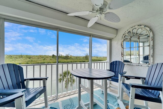 18325 Gulf Blvd Unit 407, Redington Shores, FL 33708 - sunroom featuring ceiling fan