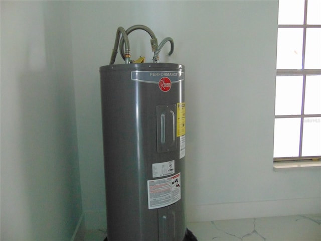 utility room with water heater