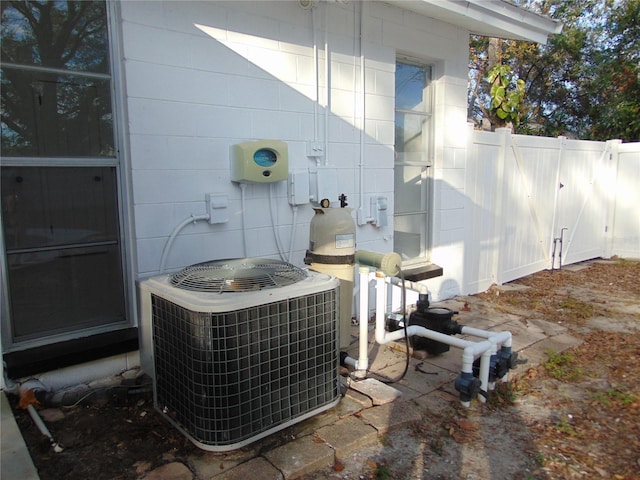 exterior details featuring cooling unit