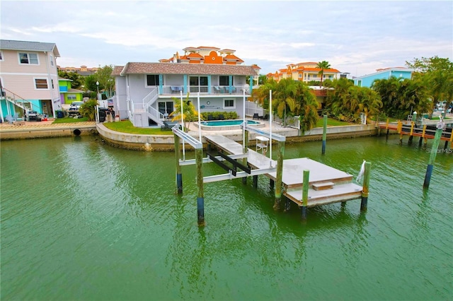 dock area with a water view