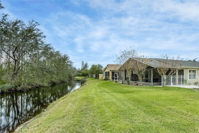 view of yard with a water view