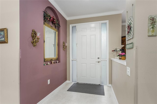 entryway featuring light tile patterned floors and ornamental molding