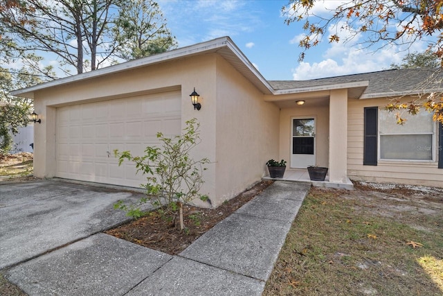 entrance to property with a garage