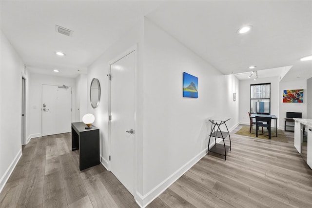 hall featuring light hardwood / wood-style flooring