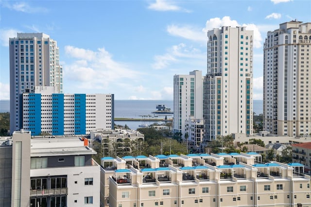 property's view of city with a water view