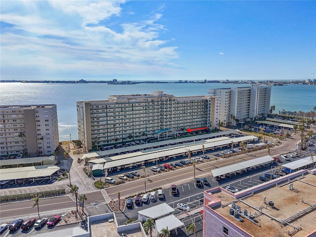 drone / aerial view with a view of city and a water view