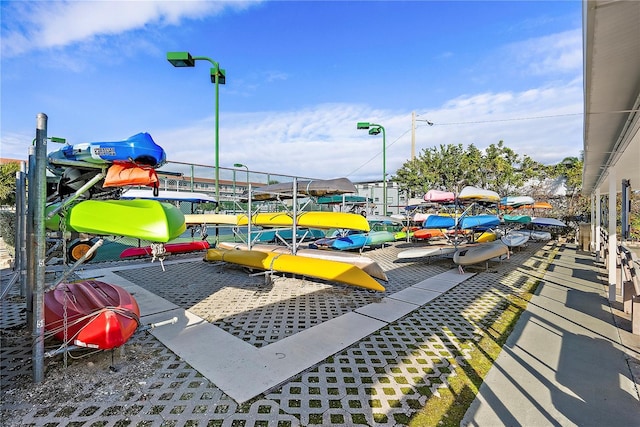 view of property's community featuring a dock