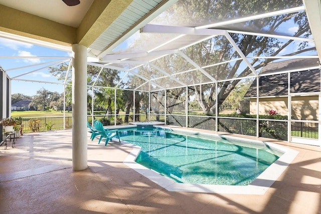 view of pool featuring a lanai and a patio