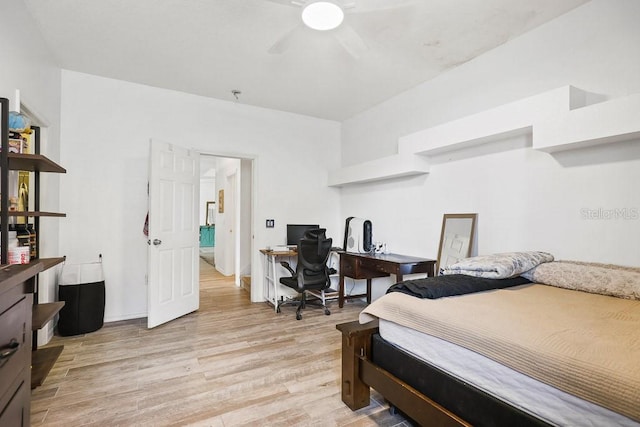 bedroom with ceiling fan and light hardwood / wood-style floors