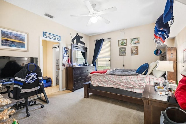 carpeted bedroom featuring ceiling fan