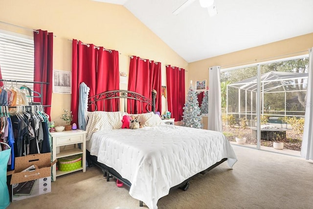 carpeted bedroom with access to outside, vaulted ceiling, and ceiling fan