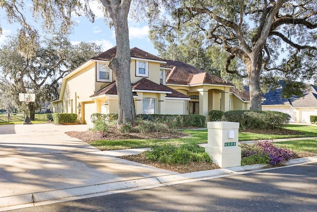 view of front of property with a garage