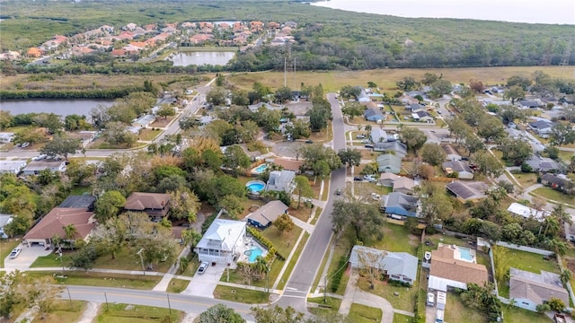 bird's eye view with a water view