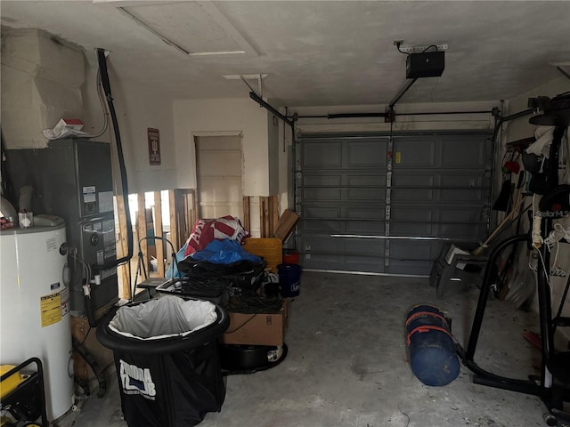 garage with gas water heater and a garage door opener