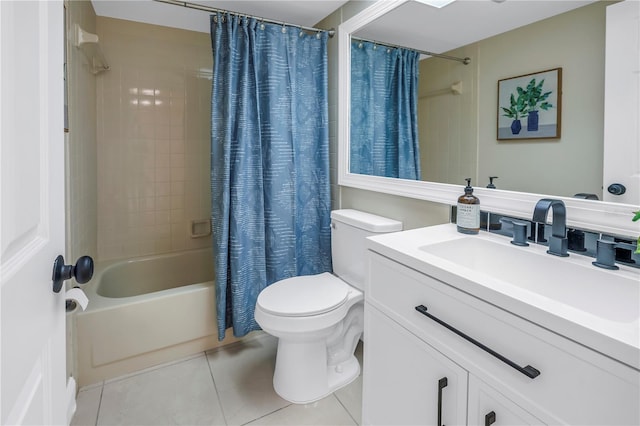 full bathroom featuring tile patterned floors, shower / tub combo with curtain, vanity, and toilet