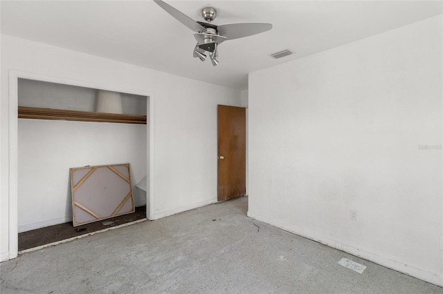 unfurnished bedroom with a closet, a ceiling fan, and baseboards