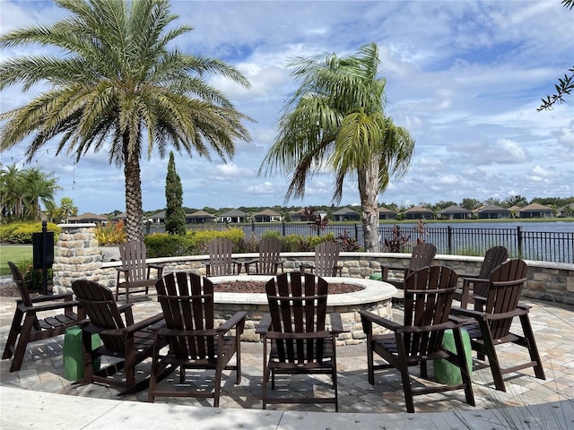 view of patio / terrace featuring an outdoor fire pit