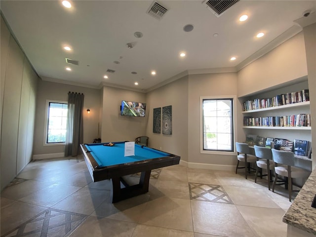 rec room with crown molding, built in features, light tile patterned floors, and billiards